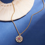 Gold-Toned Star Coin Pendant Necklace