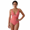 Woman wearing a red and white striped swimsuit - online swimwear shop - swimsuit shopping near me