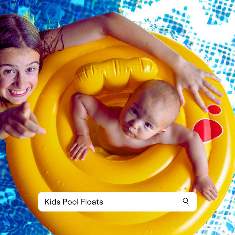Child in a yellow pool float - kids swimming pool floaters - swimming armbands - the beach company
