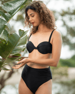 Woman wearing a black bikini - online swimwear shop - buy beachwear in mumbai - online beach shop - the beach company