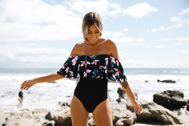 The Beach company India - cheap online swimsuits - Lily print swimsuits - Black swimsuits - off shoulder swimsuit - beachwear - swimsuit for maxi skirts- Trendy black swimsuits - Ruffle swimsuits - designer swimsuits 