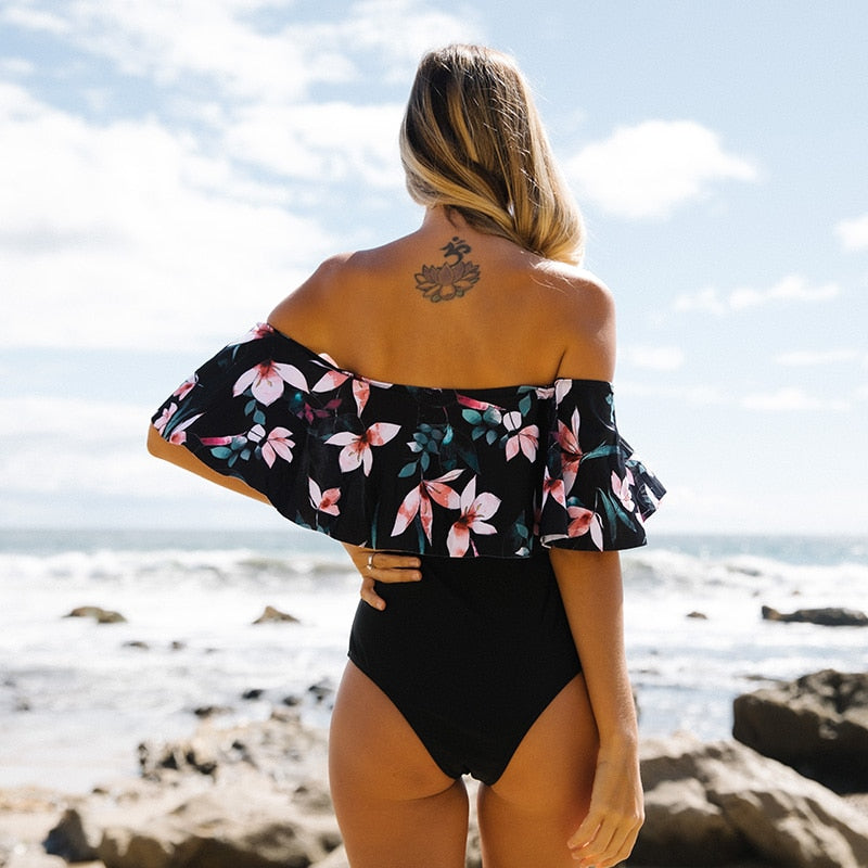 The Beach company India - cheap online swimsuits - Lily print swimsuits - Black swimsuits - off shoulder swimsuit - beachwear - swimsuit for maxi skirts- Trendy black swimsuits - Ruffle swimsuits - designer swimsuits 